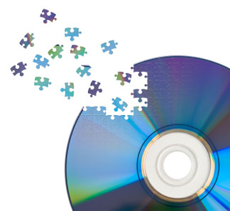 CD / DVD cut by jigsaw puzzle